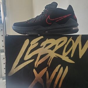 LEBRON XVII. Nike Black and Red Athletic Shoes with High-Top Design